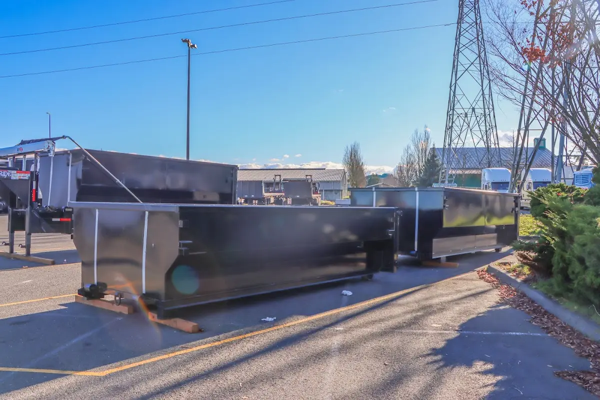 Roll-off dumpster ready for waste disposal at job site for Yard Waste Dumpster Rental in Palm Springs North